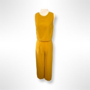Mustard yellow jumpsuit from Warehouse